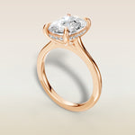 Cushion Hidden Halo Cathedral engagement ring in rose gold, angled view