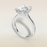 Cushion Hidden Halo Cathedral engagement ring in white gold, angled view