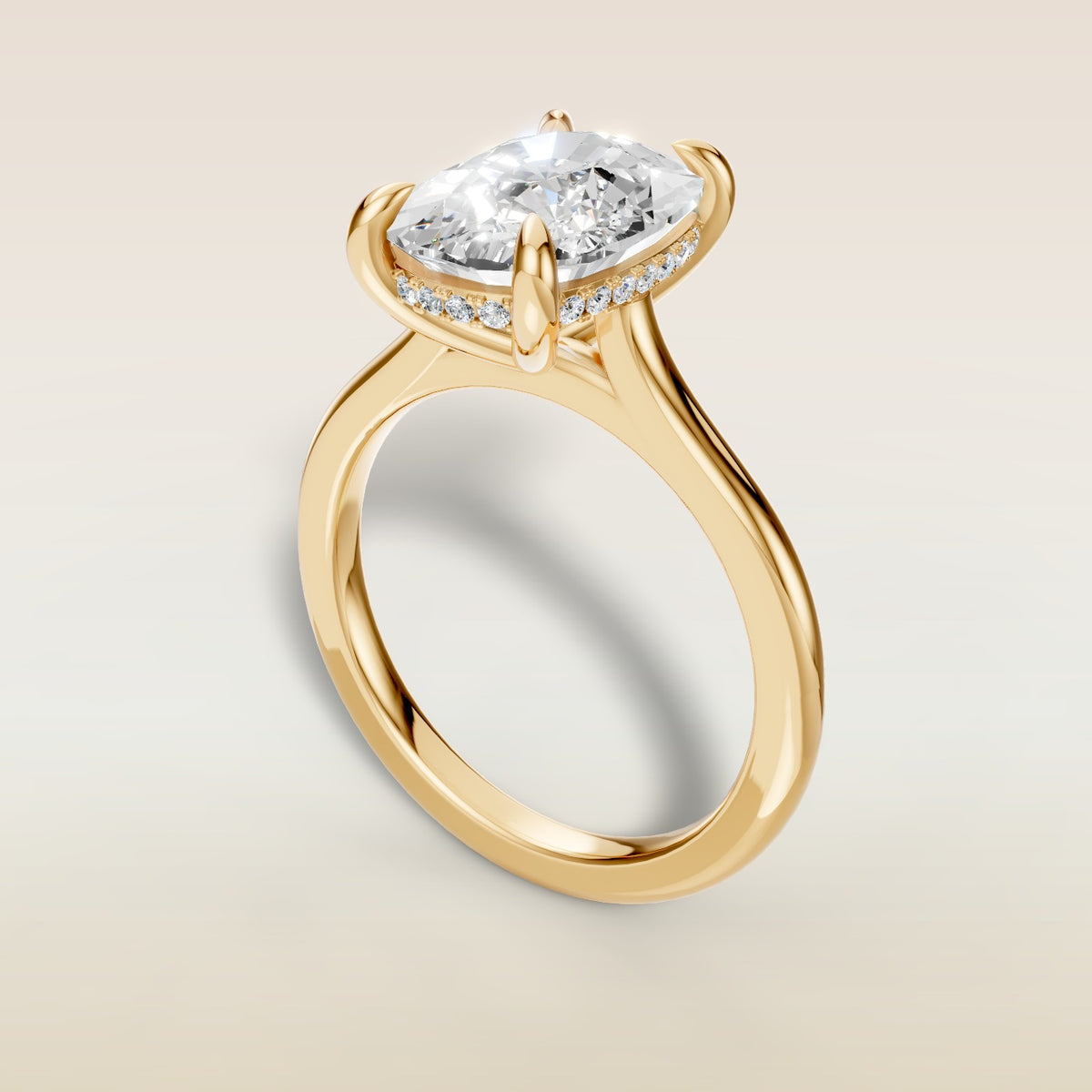 Cushion Hidden Halo Cathedral engagement ring in yellow gold, angled view
