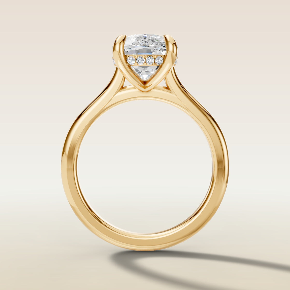 Cushion Hidden Halo Cathedral engagement ring in yellow gold, front view