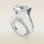 Emerald Half Bezel with Hidden Halo engagement ring in white gold, angled view
