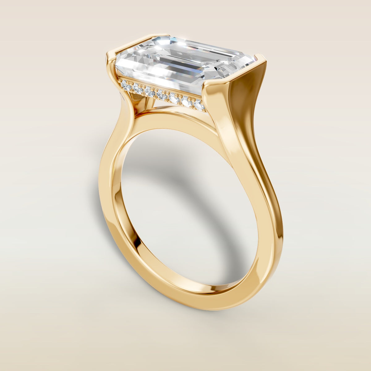Emerald Half Bezel with Hidden Halo engagement ring in yellow gold, angled view
