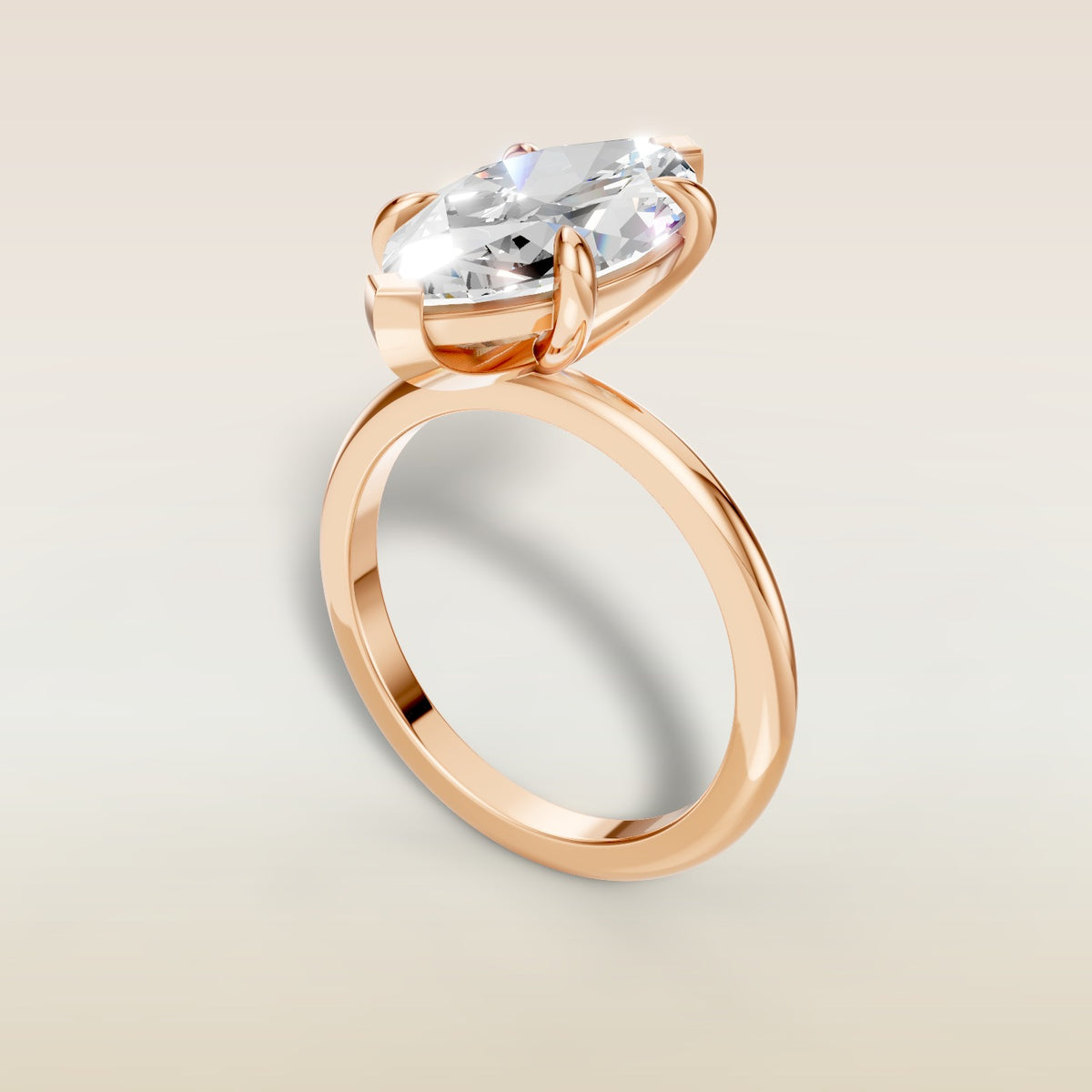 Marquise Classic Solitaire engagement ring in rose gold, angled view