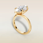 Marquise Classic Solitaire engagement ring in yellow gold, angled view