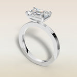 Emerald East West engagement ring in white gold, angled view