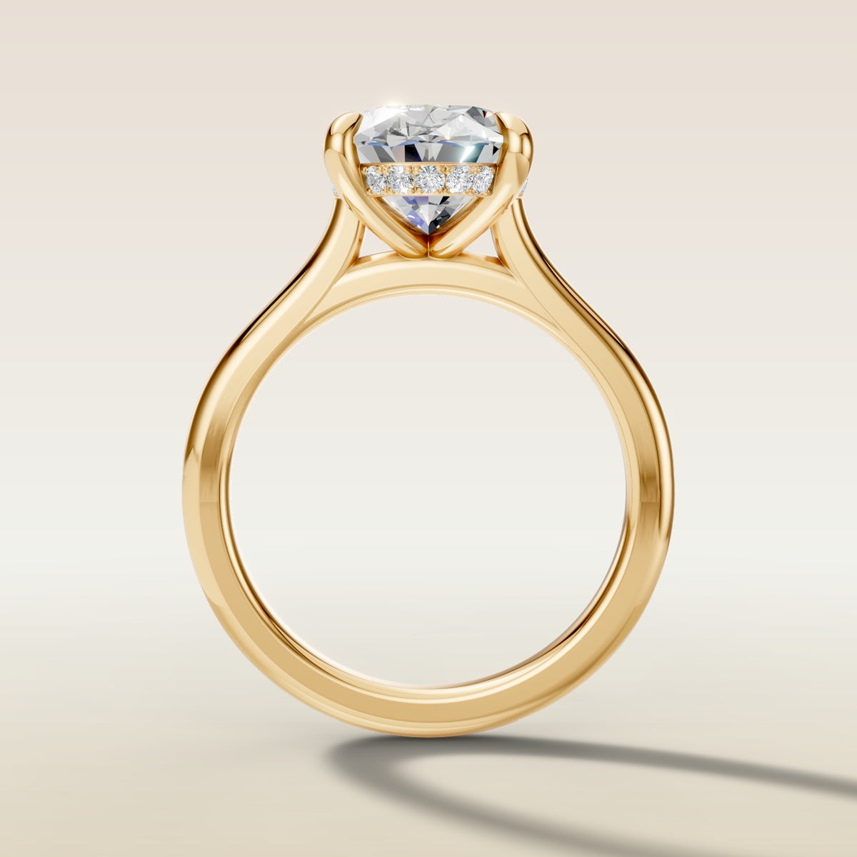 Oval Hidden Halo Cathedral engagement ring in yellow gold, front view