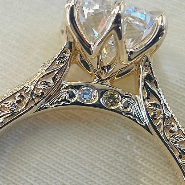 Scroll + Diamonds engraving, on the bridge