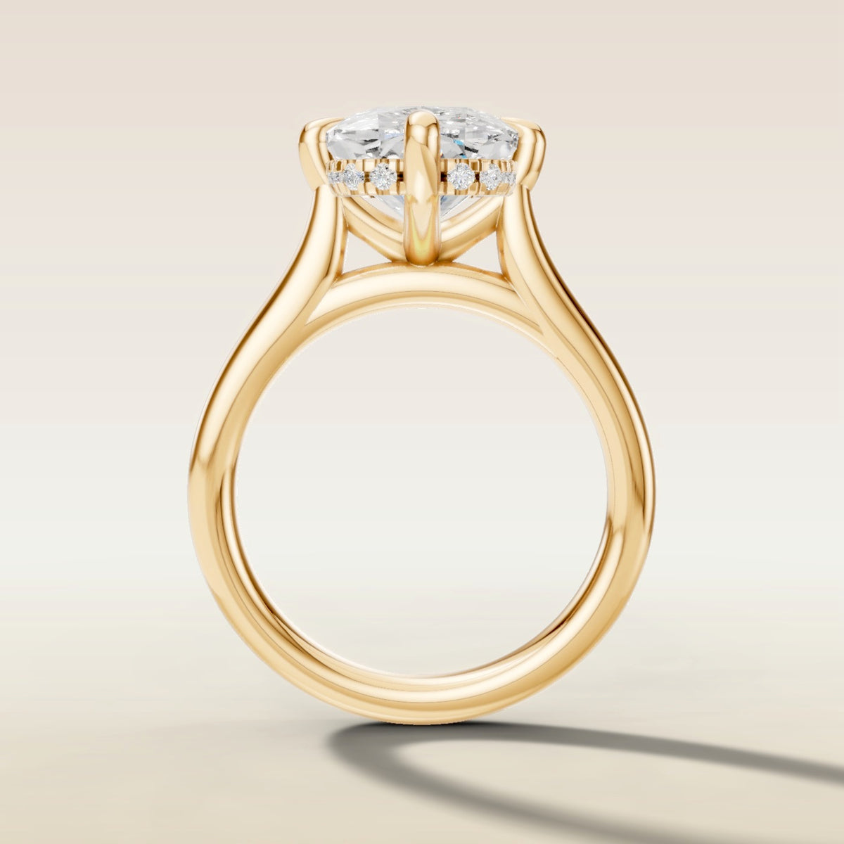 Cushion Compass Set Hidden Halo engagement ring in yellow gold, front view
