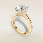 Cushion Curved Hidden Halo Diamond Bridge engagement ring in yellow gold, back angle
