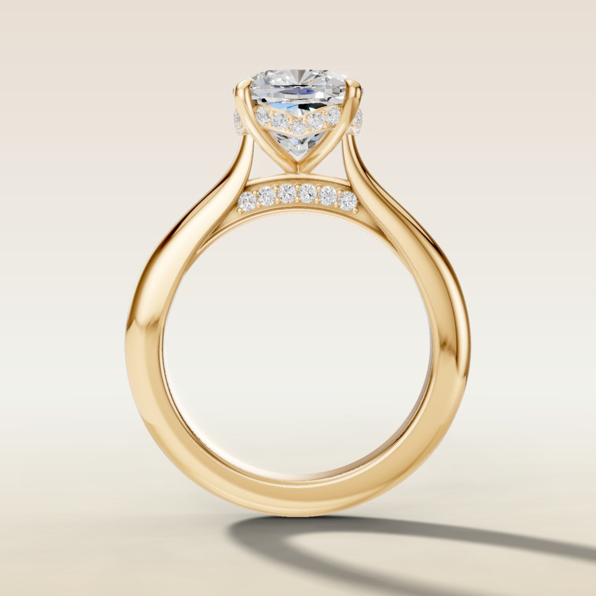 Cushion Curved Hidden Halo Diamond Bridge engagement ring in yellow gold, front view