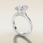 Cushion Curved Hidden Halo Diamond Bridge engagement ring in white gold, angled side view