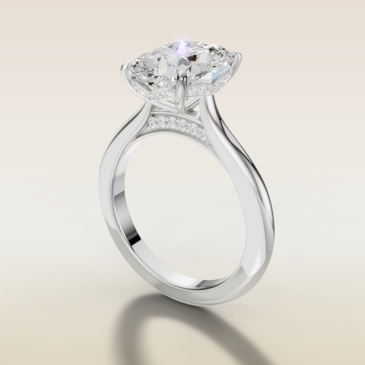 Cushion Curved Hidden Halo Diamond Bridge engagement ring in white gold, angled side view