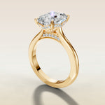 Cushion Curved Hidden Halo Diamond Bridge engagement ring in yellow gold, angled side view