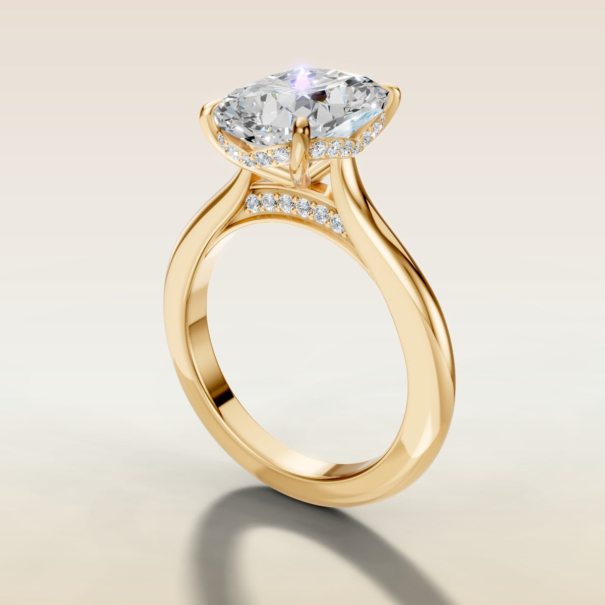 Cushion Curved Hidden Halo Diamond Bridge engagement ring in yellow gold, angled side view