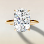 Cushion Curved Hidden Halo Diamond Bridge engagement ring in yellow gold, top view