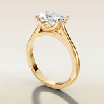 Cushion East West Half Petal Tulip engagement ring in yellow gold, angled side view