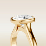 Cushion Full Bezel Cathedral engagement ring in gold, basket close up