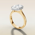 Cushion Full Bezel Hidden Halo engagement ring in gold, angled side view