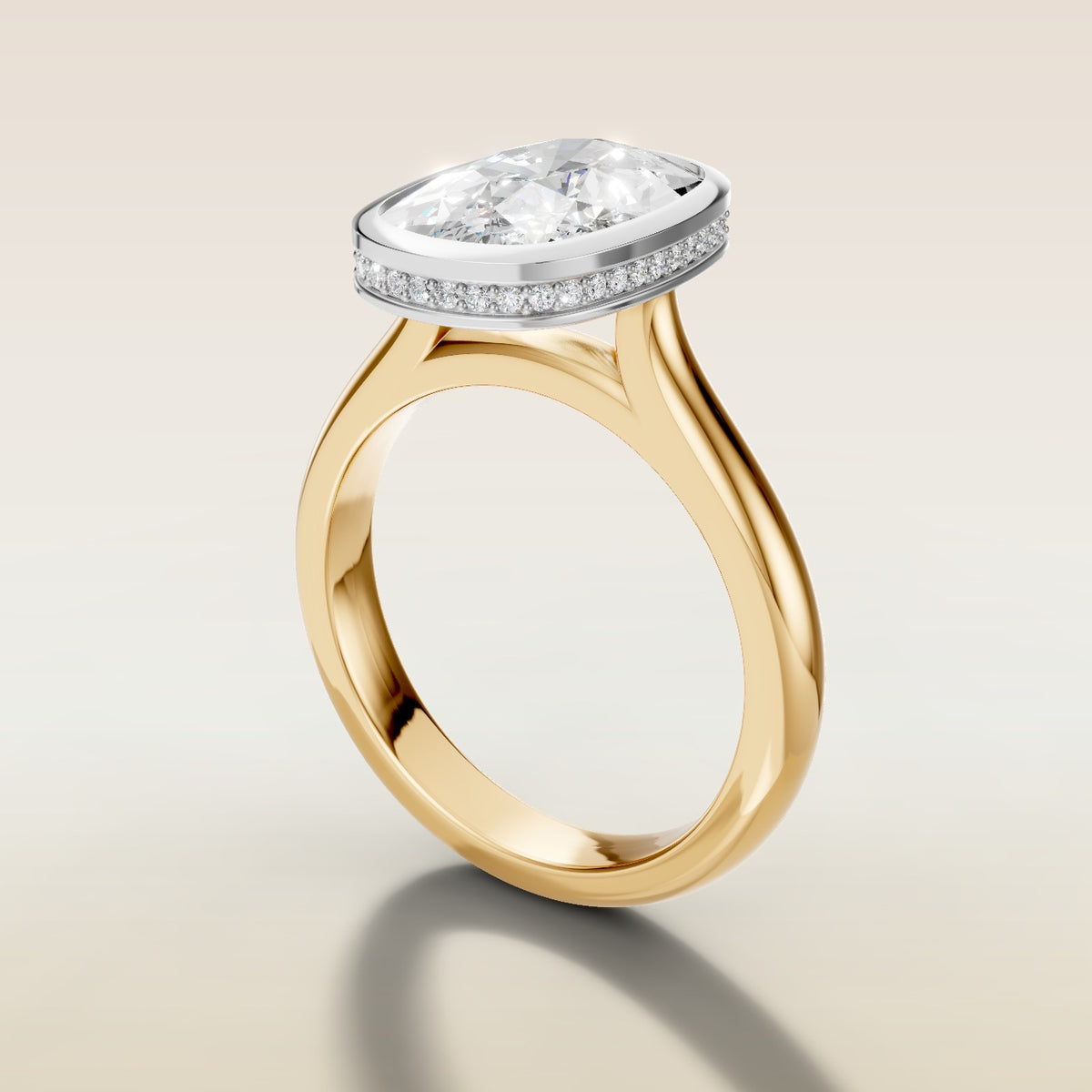 Cushion Full Bezel Hidden Halo engagement ring in gold, angled side view