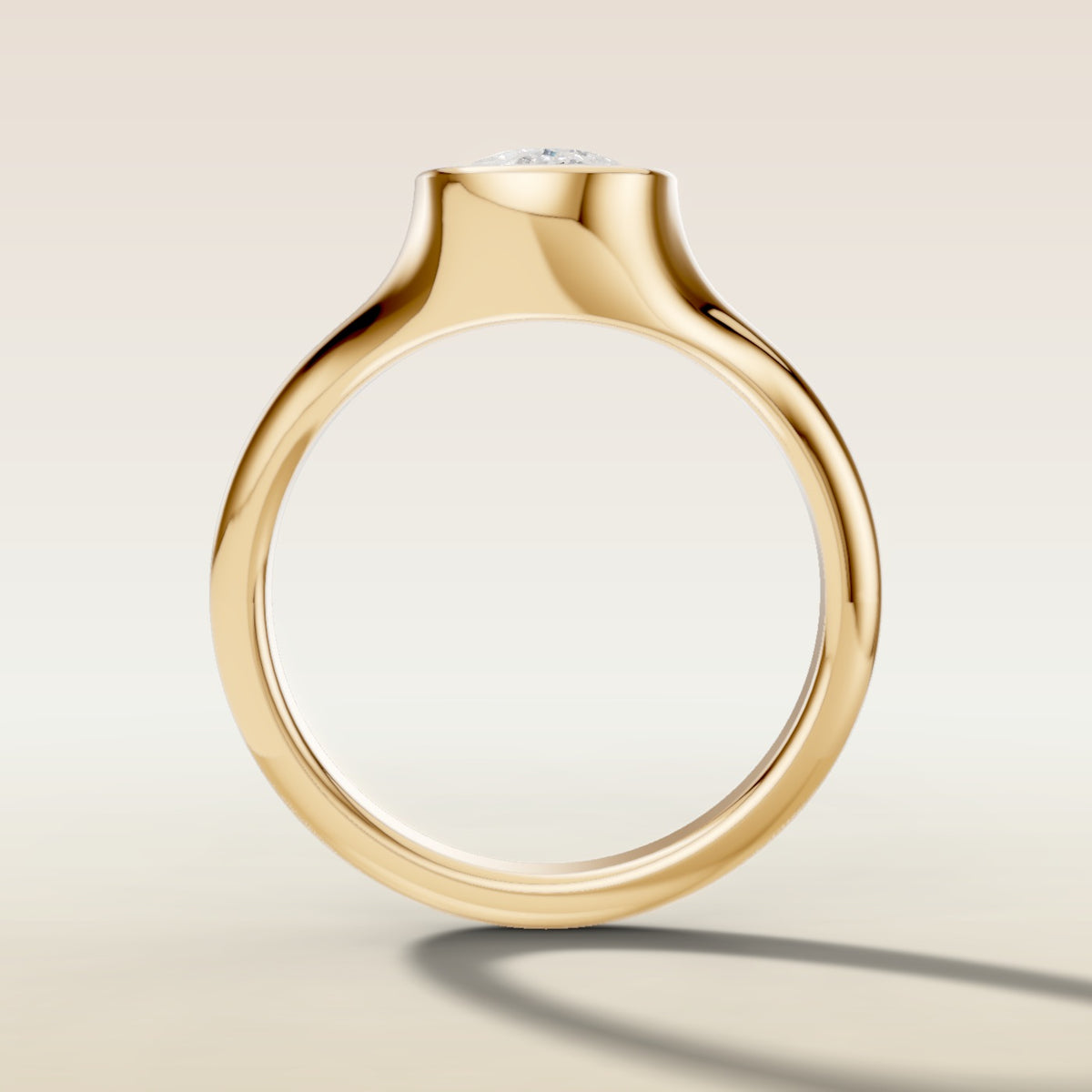 Cushion Full Bezel Low Profile engagement ring in yellow gold, front view