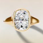 Cushion Full Bezel Low Profile engagement ring in yellow gold, top view