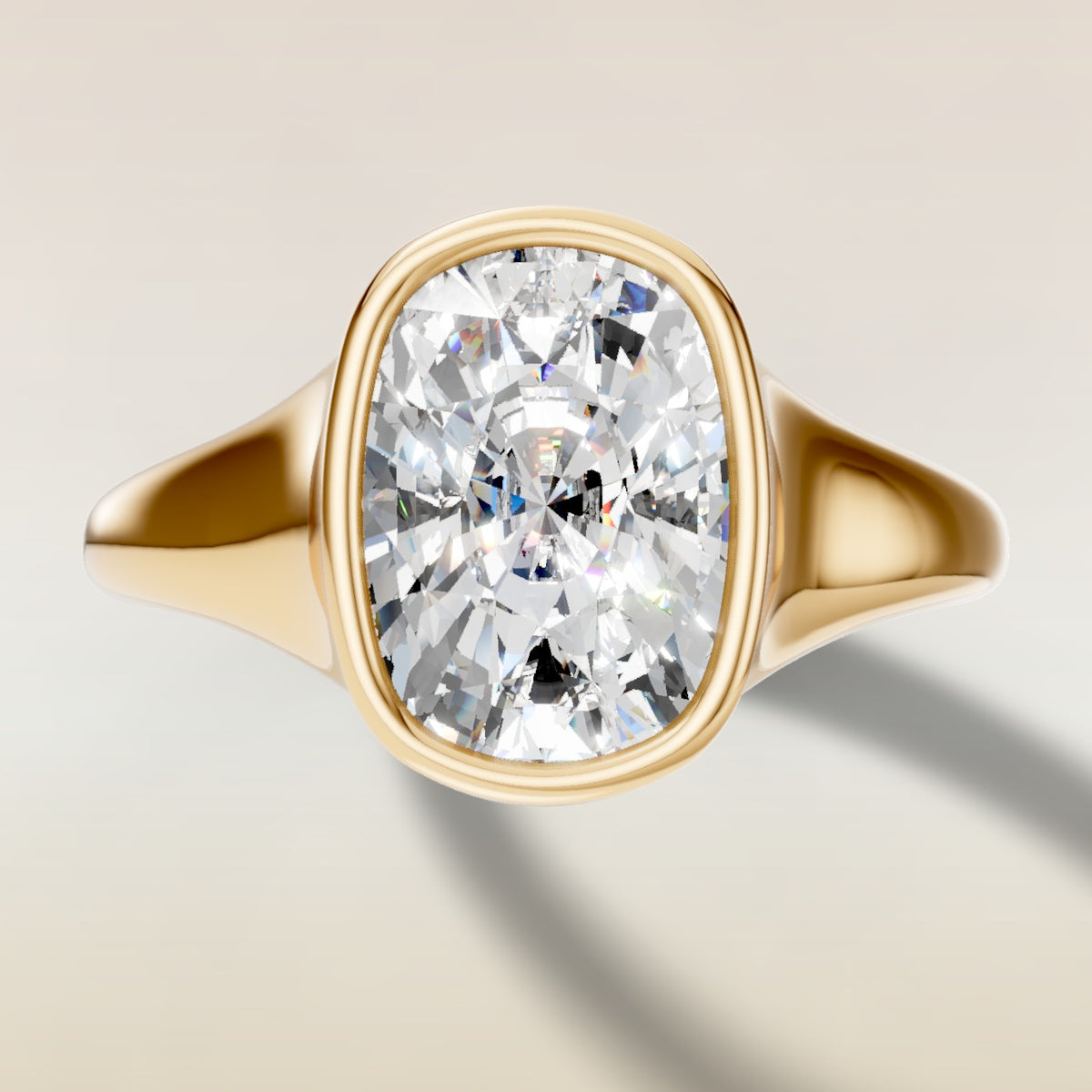 Cushion Full Bezel Low Profile engagement ring in yellow gold, top view