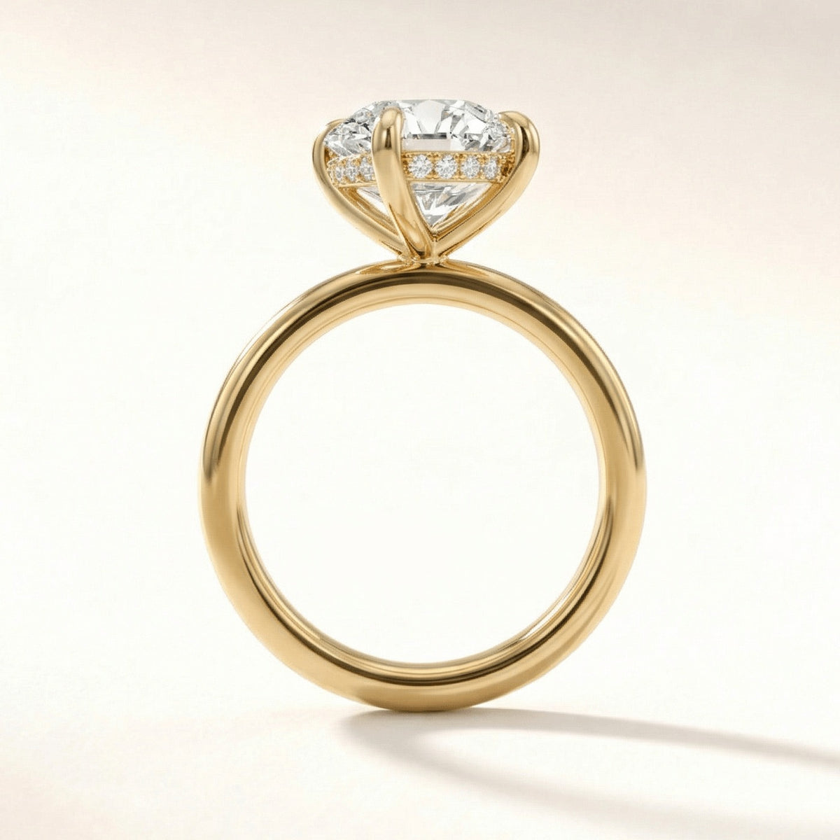 Hidden Halo Solitaire cushion cut lab grown diamond ring yellow gold angle view