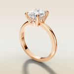 Cushion Low Profile Hidden Halo engagement ring in rose gold, angled side view