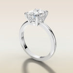 Cushion Low Profile Hidden Halo engagement ring in white gold, angled side view