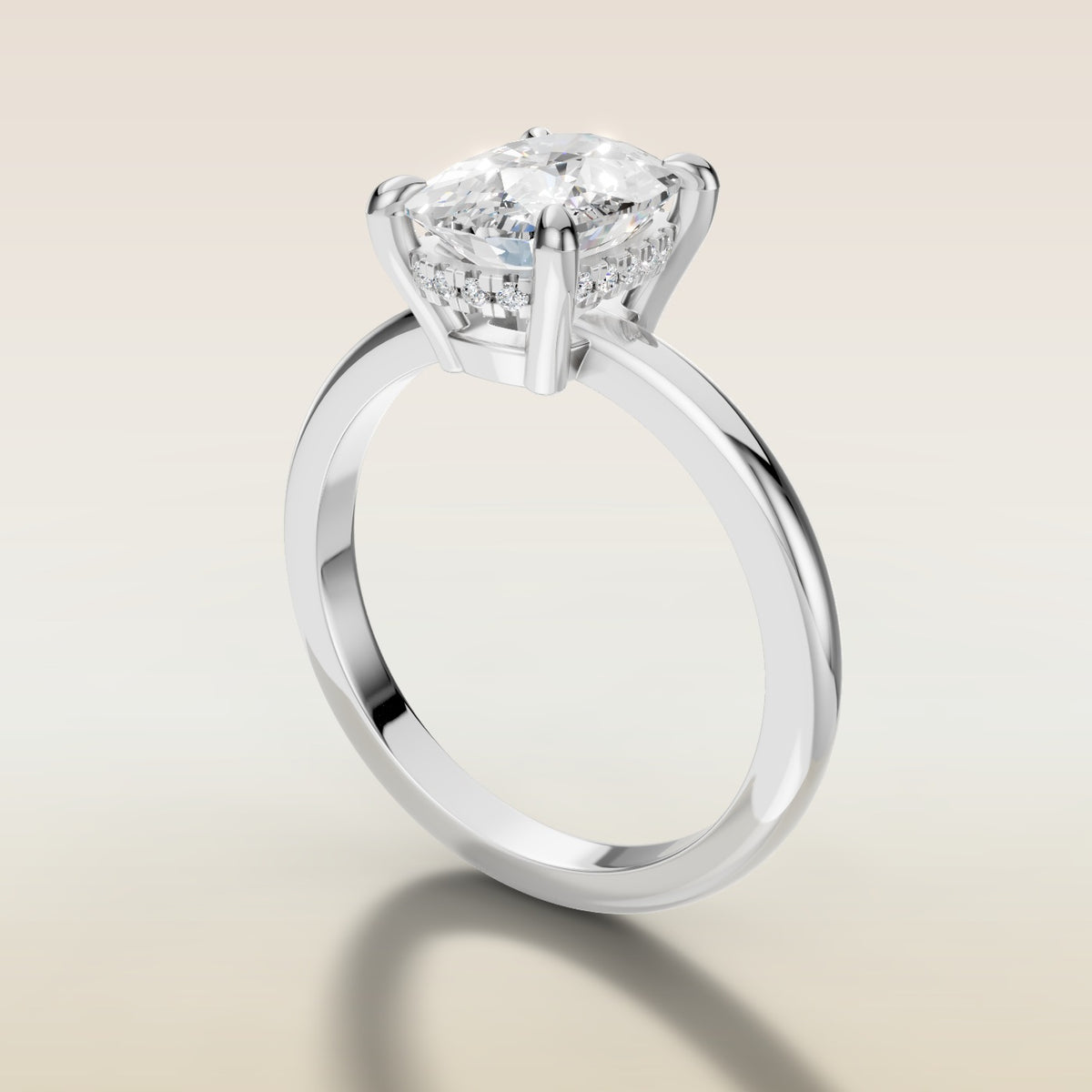 Cushion Low Profile Hidden Halo engagement ring in white gold, angled side view