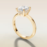 Cushion Low Profile Hidden Halo engagement ring in yellow gold, angled side view