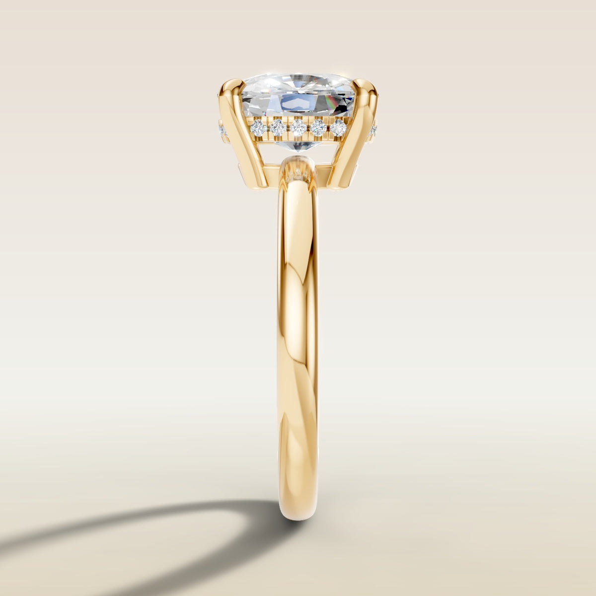 Cushion Low Profile Hidden Halo engagement ring in yellow gold, side profile