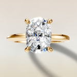 Cushion Low Profile Hidden Halo engagement ring in yellow gold, top view
