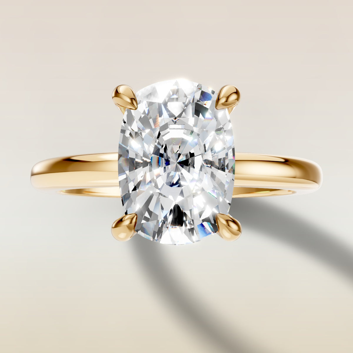 Cushion Low Profile Hidden Halo engagement ring in yellow gold, top view