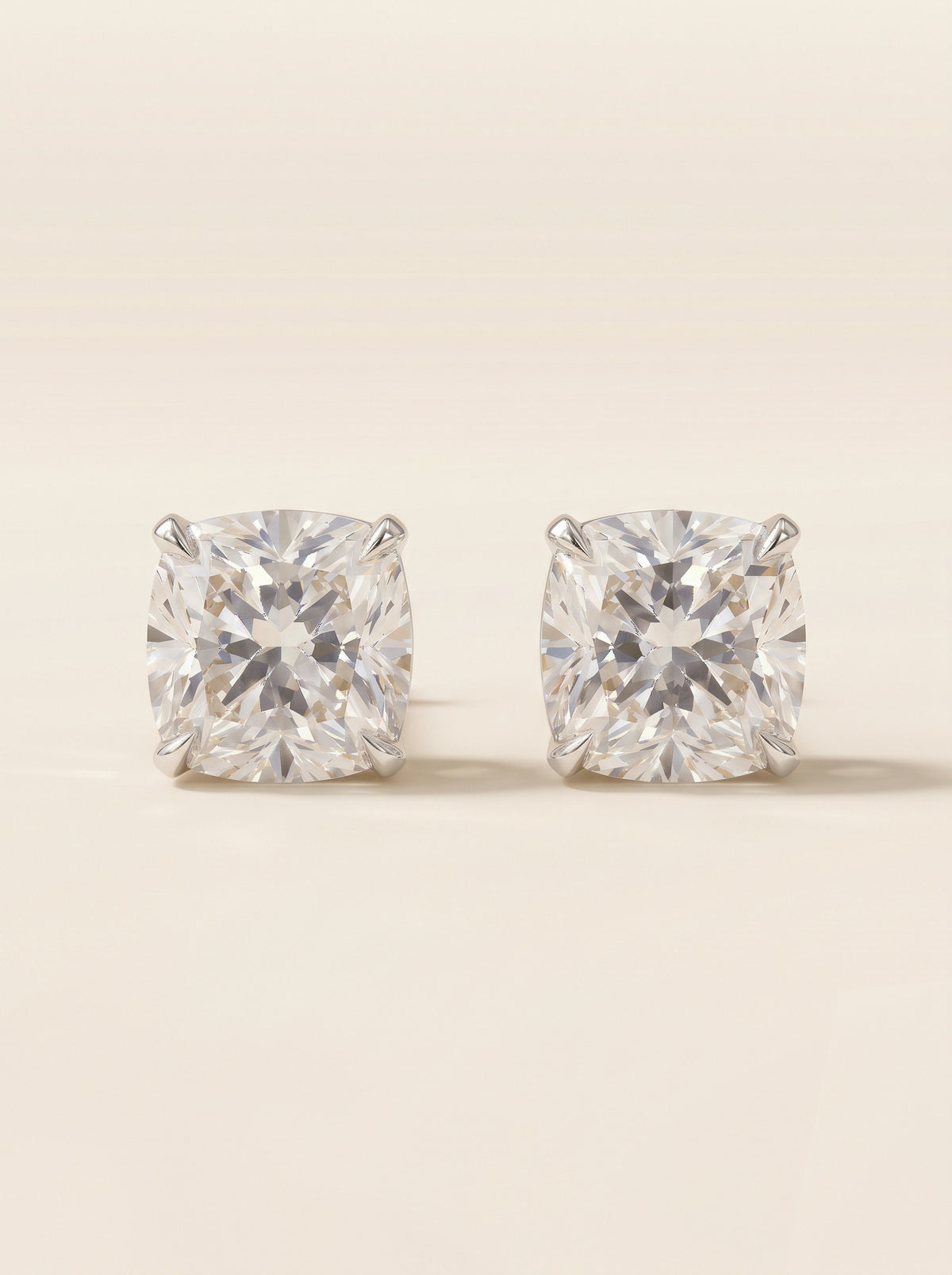 Cushion diamond stud earrings in 14K white gold