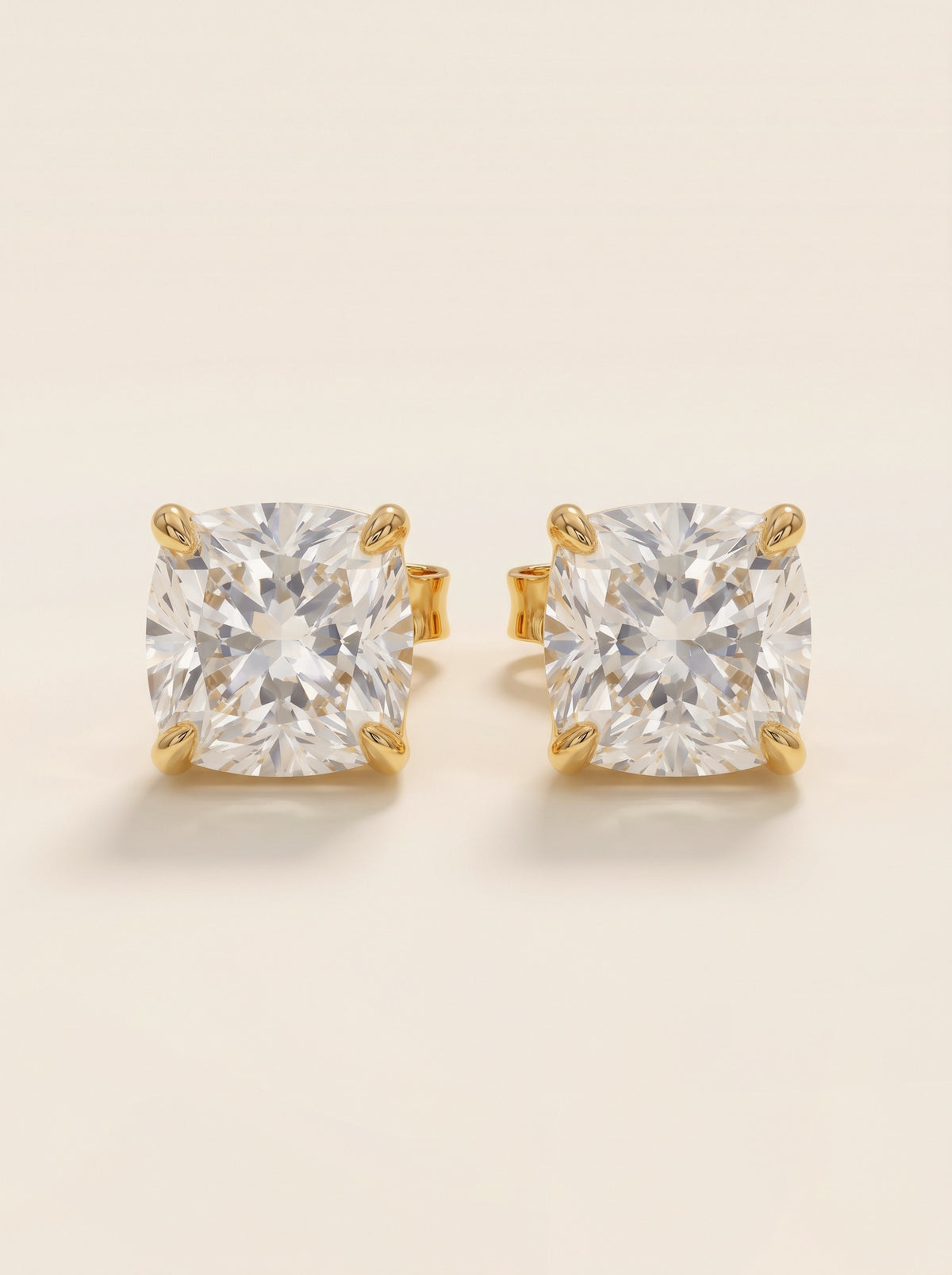 Cushion diamond stud earrings in 14K yellow gold