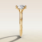 Cushion Three Stone Hidden Halo engagement ring in yellow gold, side profile