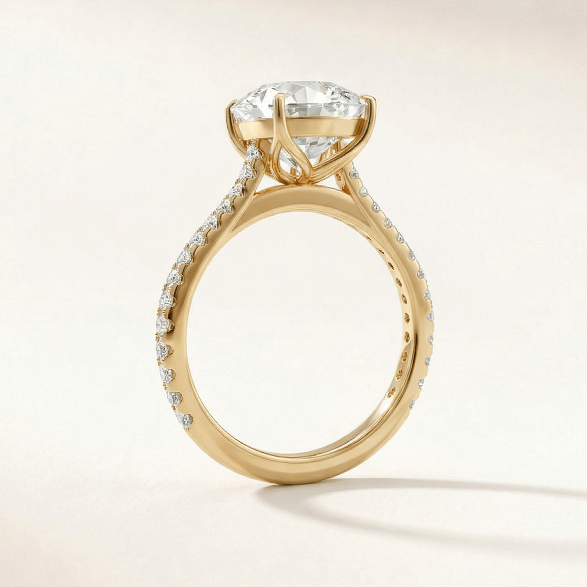 Tulip Classic Pave engagement ring with a cushion diamond in yellow gold