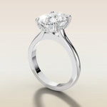 Cushion Tulip Curved Hidden Halo Double Prong engagement ring in white gold, angled side view