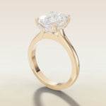 Cushion Tulip Curved Hidden Halo Double Prong engagement ring in yellow gold, angled side view