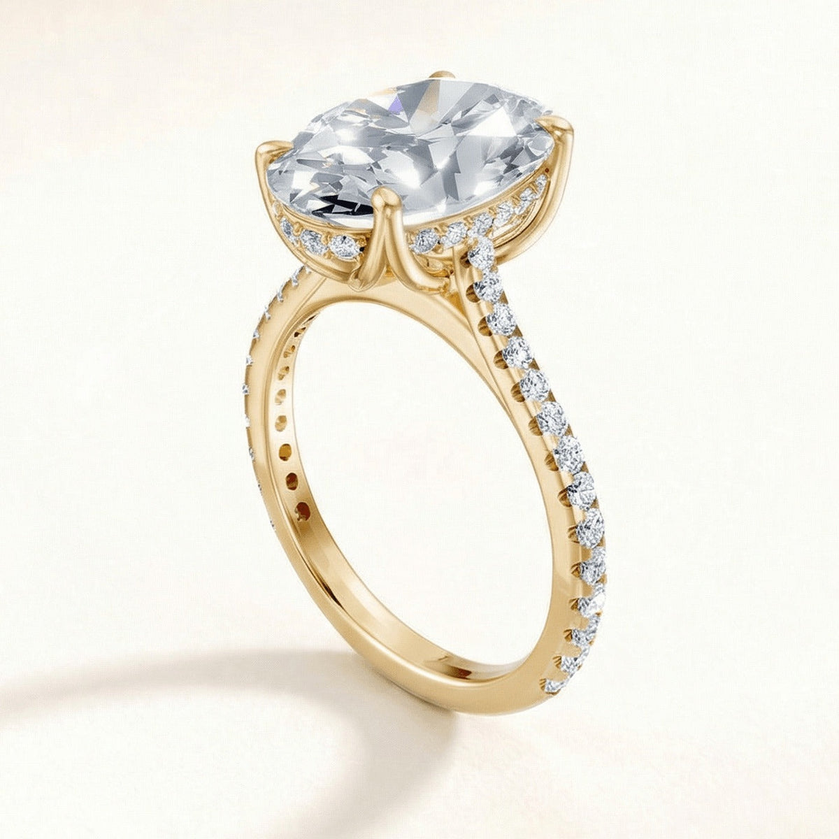 Tulip Hidden Halo Pave engagement ring with a cushion diamond in yellow gold