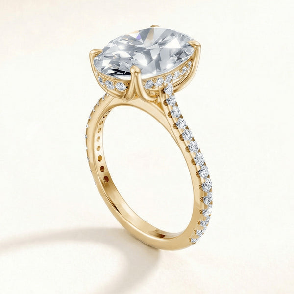 Tulip Hidden Halo Pave engagement ring with a cushion diamond in yellow gold