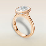 Cushion Full Bezel Hidden Halo engagement ring in rose gold, angled view