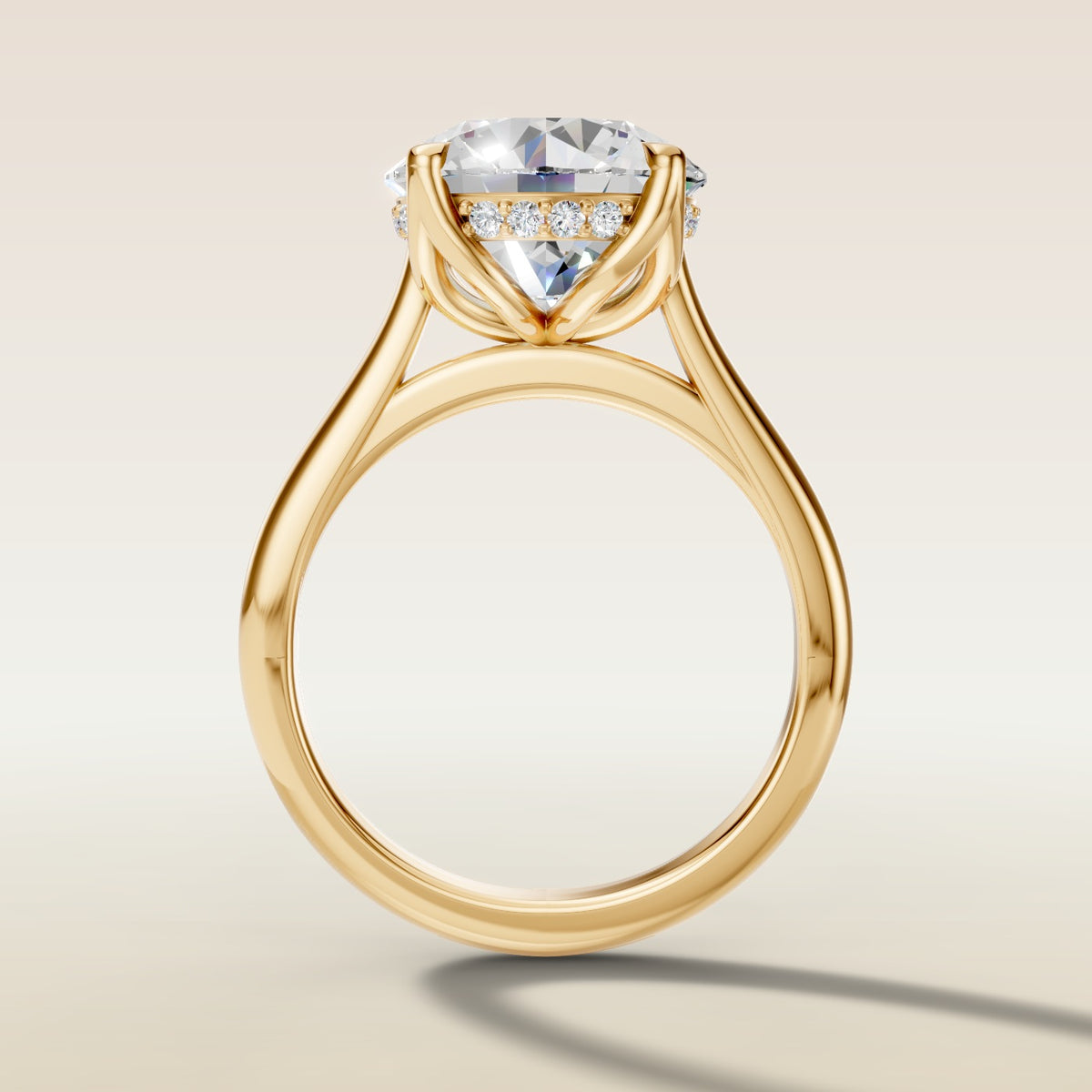 Round Tulip with Hidden Halo engagement ring in yellow gold, front view