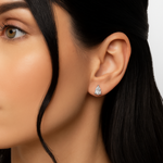 Pear shaped lab grown diamond stud earrings worn