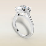 Round Full Bezel Split Shank engagement ring in white gold, angled view