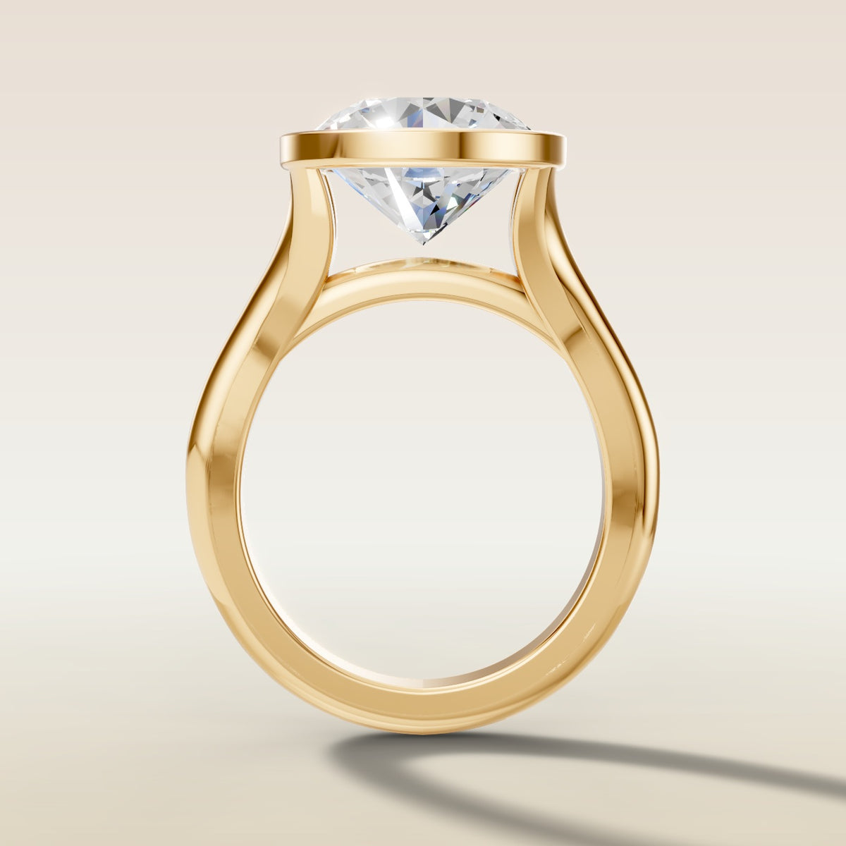Round Full Bezel Split Shank engagement ring in yellow gold, front view