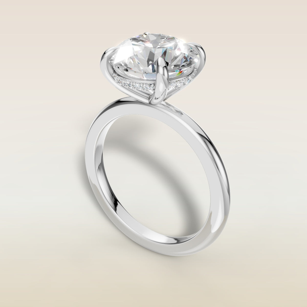 Round Hidden Halo Solitaire engagement ring in white gold, angled view