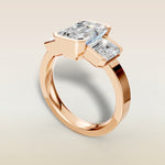Emerald Three Stone Half Bezel Thick Band engagement ring in rose gold, angled view