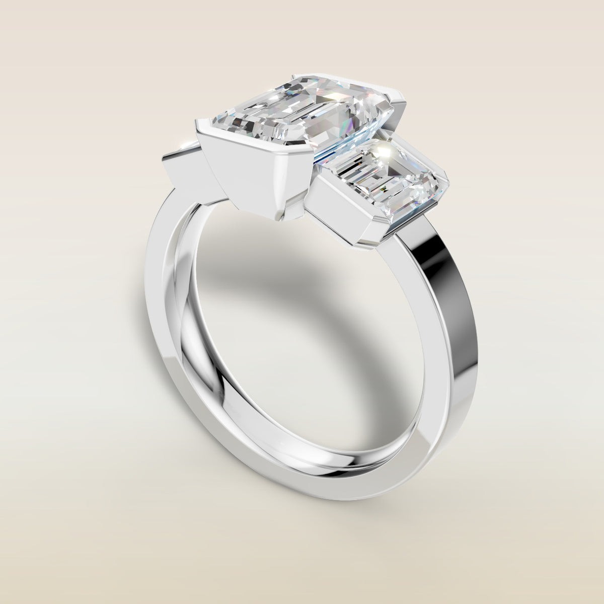 Emerald Three Stone Half Bezel Thick Band engagement ring in white gold, angled view